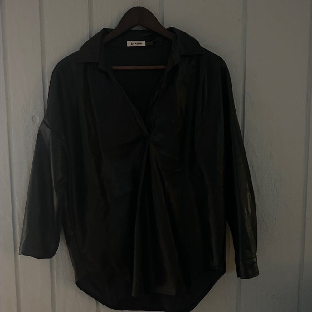 Faux leather! Very soft and smooth! Worn once! Beautiful black!